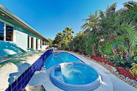 Canal front Dream W / Private Pool Spa  Dock 3 Bedroom Home