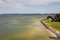 Oceanfront White Stone Cottage w / Private Beach