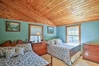 Spacious Wolcott Lake Cottage w / Wraparound Deck