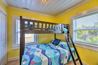 Colorful Cottage with Patio  Steps to Beach