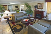 Super 6 Inn  Suites Gonzales